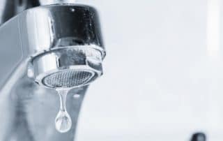 Closeup of leaking faucet