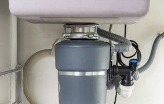 Garbage disposal under a sink