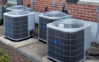 Air conditioning units outside of an apartment complex